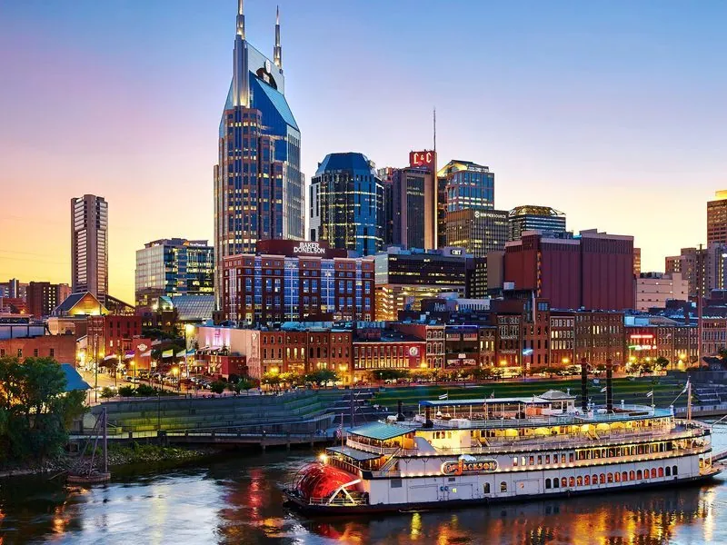 A riverboat on the Cumberland River at sunset in Nashville